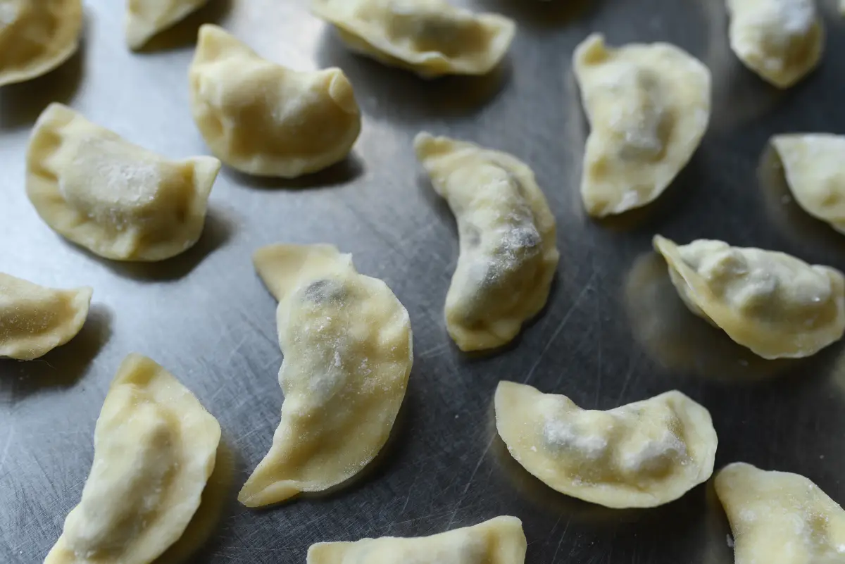 Вареники с картофелем и грибами Изображение Вареники с картофелем и грибами - Тугарин