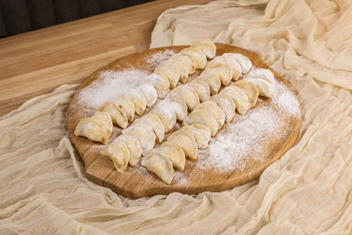 Вареники с картофелем и грибами Изображение Вареники с картофелем и грибами - Тугарин